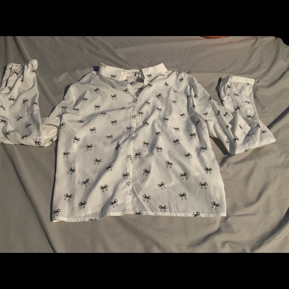 White and black dress shirt.